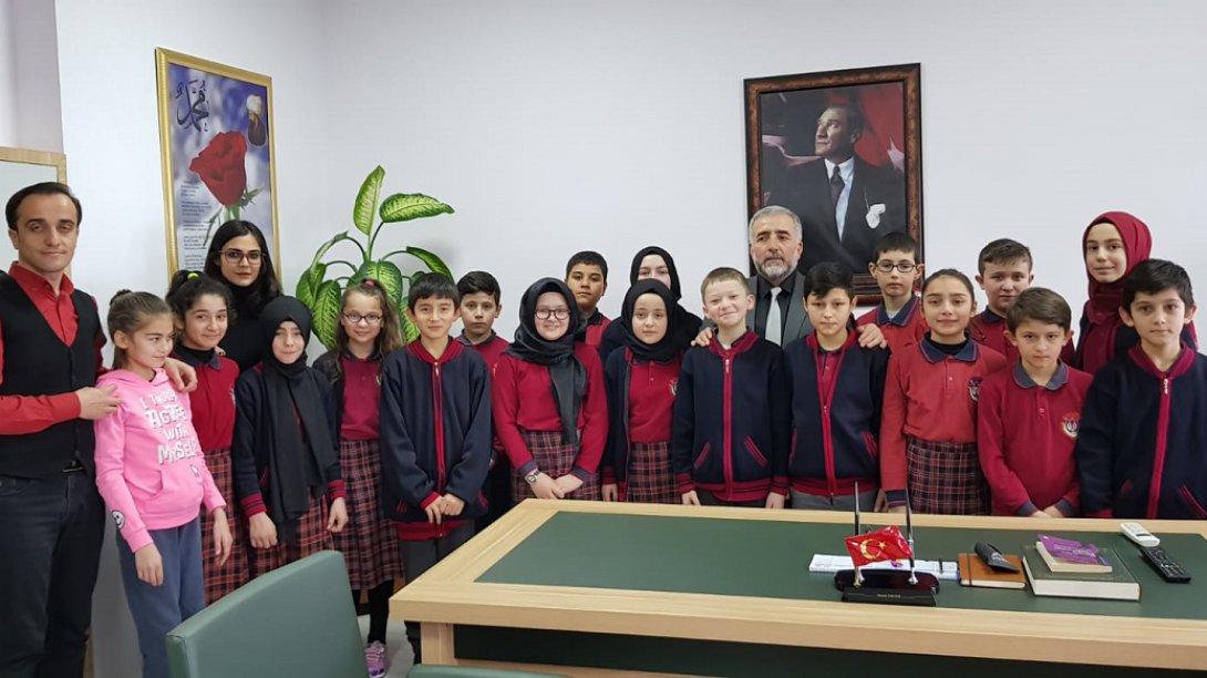 Şehit Hüseyin Gümüş İmam Hatip Ortaokulu 6-A sınıfı sınıfı öğrencileri İlçe Milli Eğitim Müdürümüz Sayın Murat ÇULFAZ´ı ziyaret ettiler.